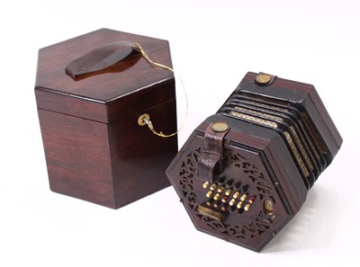 Lot 688 - A late Victorian Concertina of typical...