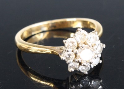 Lot 2551 - A yellow and white metal diamond circular...