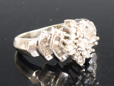 Lot 2552 - A white metal diamond navette style cluster...