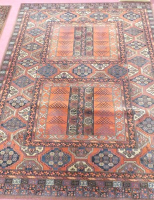 Lot 1160 - Two contemporary red ground machine woven...