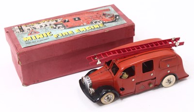 Lot 1962 - Triang Minic wind up Fire Engine, in a red...