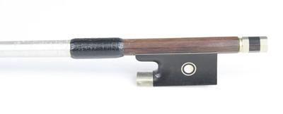 Lot 648 - A violin bow having a nickel adjuster with...