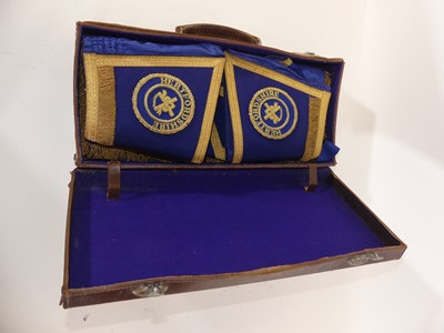 Lot 88 - A leather case containing masonic regalia,...