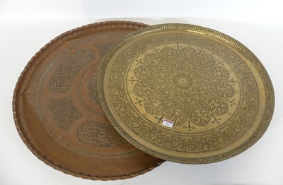 Lot 91 - An Indian circular brass tray, profusely...