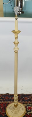 Lot 1184 - A cream and gilt painted fluted standard lamp