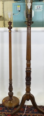 Lot 1185 - A mahogany turned and fluted standard lamp,...