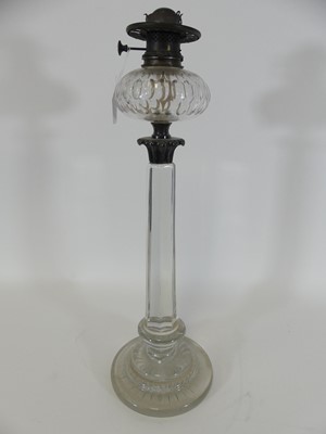 Lot 109 - A Victorian cut clear glass oil lamp, having a...