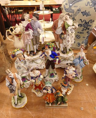 Lot 111 - A collection of nine porcelain figures to...