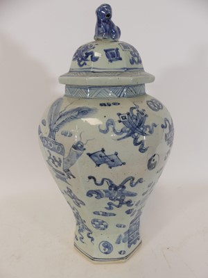 Lot 124 - A Chinese blue & white glazed temple jar of...