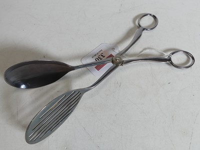 Lot 330 - A pair of George VI silver asparagus servers,...