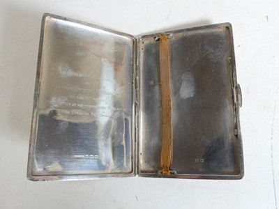 Lot 339 - A George VI silver pocket cigarette case, the...