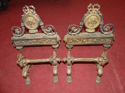 Lot 142 - A pair of 19th century gilt metal fire dogs,...