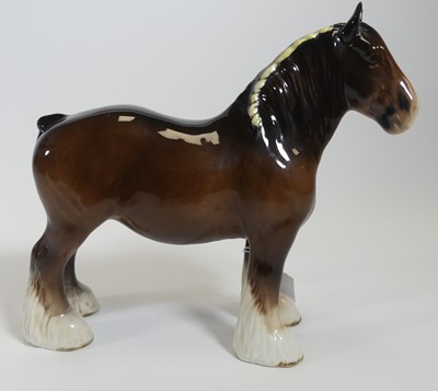 Lot 184 - A Beswick brown glazed pottery figure of a...