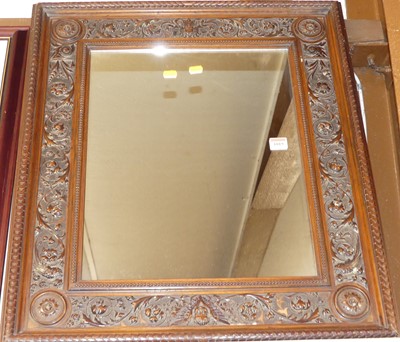 Lot 1019 - A circa 1900 carved walnut framed rectangular...