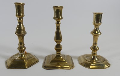 Lot 205 - An early 18th century brass candlestick having...