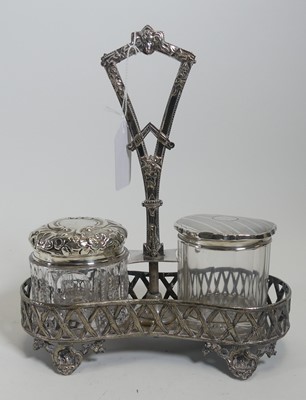 Lot 228 - A continental silver plated bottle stand,...