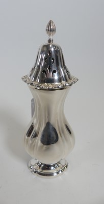 Lot 229 - An Elizabeth II silver sugar caster, of fluted...