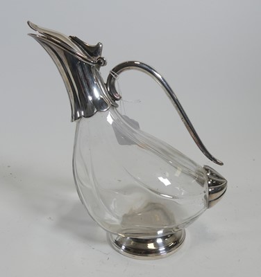 Lot 236 - A glass claret jug, having silver plated...