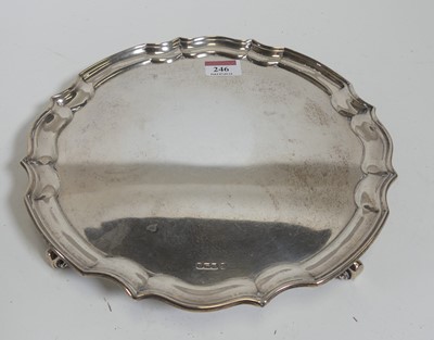 Lot 246 - A George V silver salver, having a piecrust...