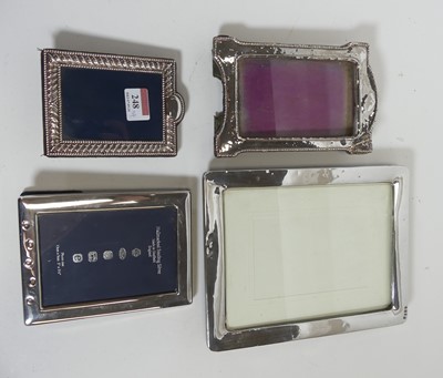 Lot 248 - A George V silver clad easel photograph frame,...