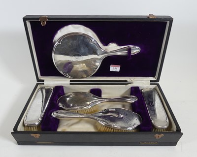 Lot 250 - A George V silver clad dressing table brush...