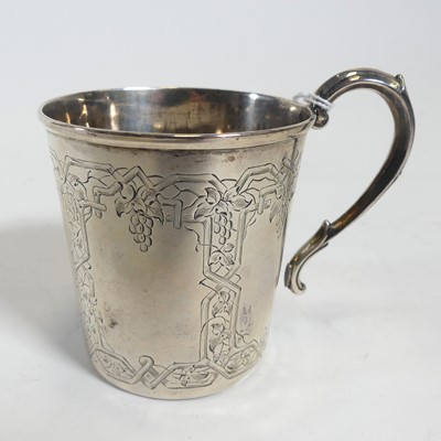 Lot 265 - A silver christening mug, having engraved vine...