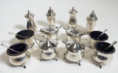 Lot 270 - A George V silver six piece cruet set,...