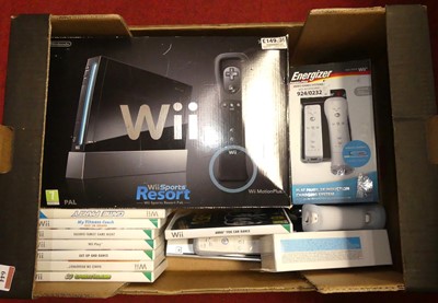 Lot 644 - A Nintendo Wii console, with games and...