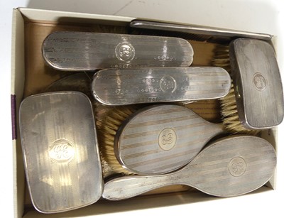 Lot 285 - A silver clad dressing table brush set, marks...