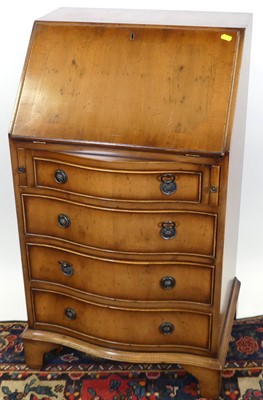 Lot 1235 - A reproduction yew wood narrow writing bureau,...