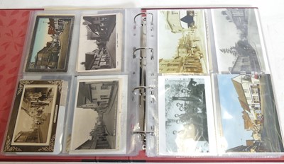 Lot 529 - A collection of postcards and photographs,...