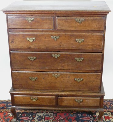 Lot 1248 - An 18th century provincial oak chest on stand,...