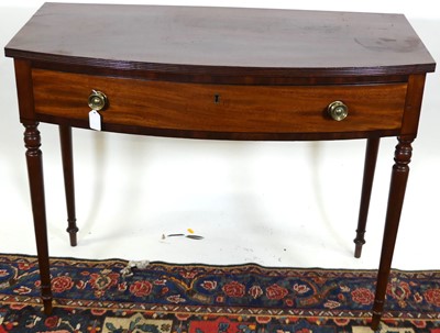 Lot 1261 - A Regency mahogany bow front single drawer...