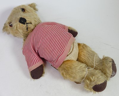 Lot 570 - A vintage blond mohair teddy-bear, having...