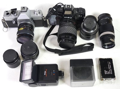 Lot 576 - A collection of cameras and lenses, to include...