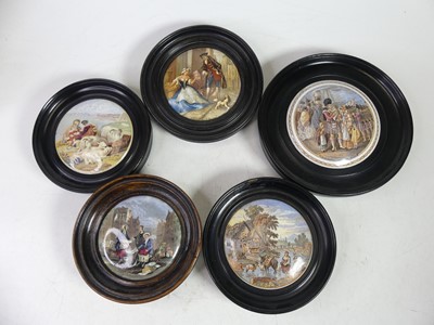 Lot 577 - A collection of Prattware pot lids (5)