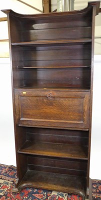 Lot 1277 - An early 20th century oak freestanding student'...