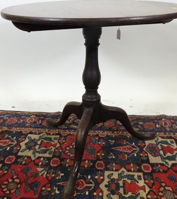 Lot 1289 - A George III mahogany circular tilt-top...