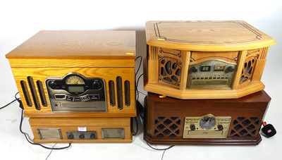 Lot 612 - A combination record and CD player in wooden...