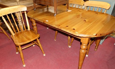 Lot 1325 - A modern pine dining suite, comprising; D-end...