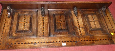 Lot 1329 - A joined oak and chequer inlaid three-panelled...