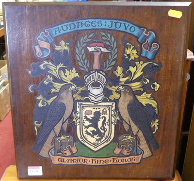 Lot 1120 - A polychrome painted coat of arms on walnut...