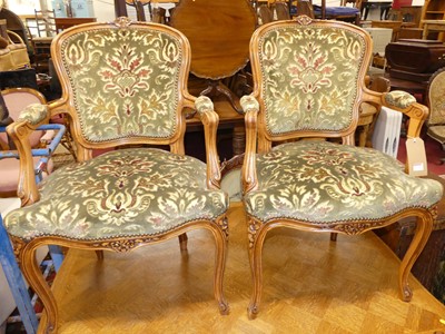 Lot 1334 - A pair of French stained beech framed and...