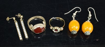 Lot 396 - A yellow metal, garnet and seed pearl set...