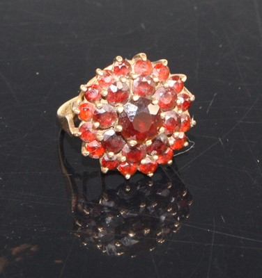 Lot 418 - A modern 9ct gold garnet flower head cluster...