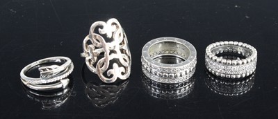 Lot 438 - A Pandora silver ALE50 eternity ring; together...