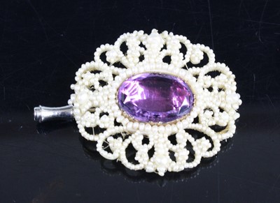 Lot 447 - A gilt metal, amethyst and seed pearl openwork...