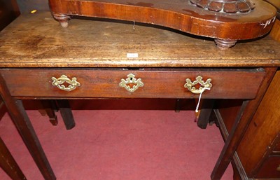 Lot 1396 - A George III mahogany low single drawer side...