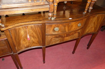 Lot 1399 - An early 20th century mahogany serpentine...