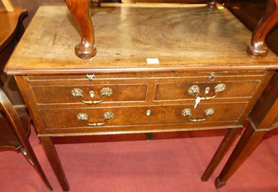 Lot 1400 - A George III mahogany three drawer low boy,...